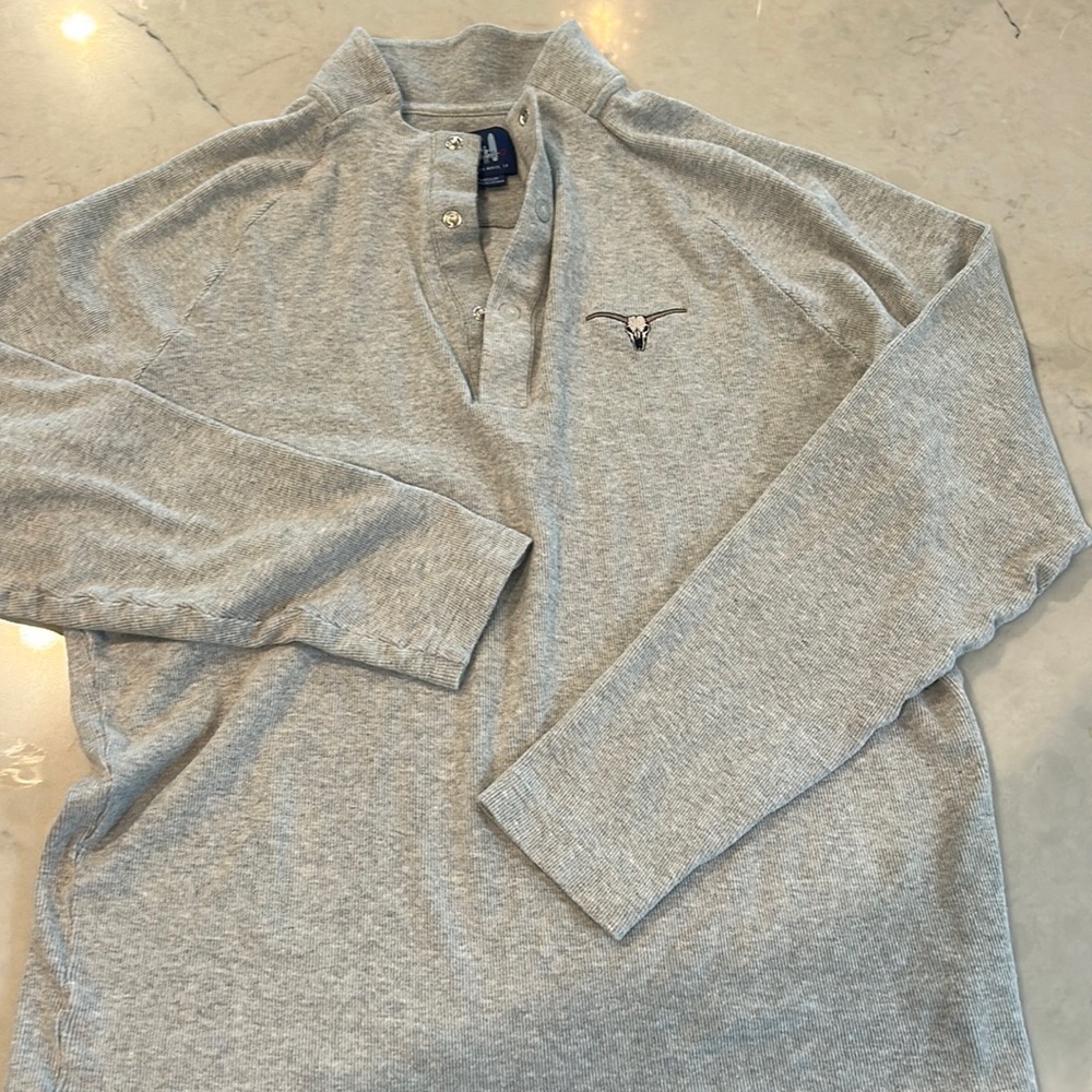 jonnie O jacket size medium fairly new. A little short in length at the stomach